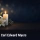 Fostoria News Memorial candle and lilies for Carl Edward Myers obituary.